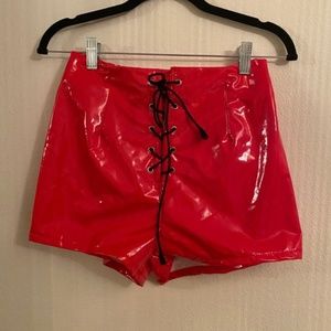 RED PLEATHER LACE UP SHORTS